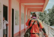 실전 같은 훈련, 전기차 화재 예방 앞장 a person wearing a backpack