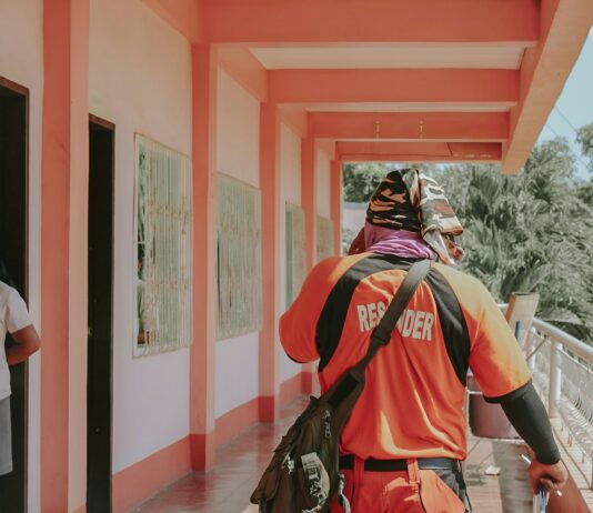 실전 같은 훈련, 전기차 화재 예방 앞장 a person wearing a backpack