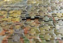 인지 능력 올리는 활동 a close up view of a puzzle piece