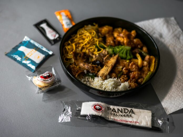 A bowl of food sitting on top of a table