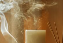 “마음도 운동이 필요하다” — 일상 속에서 실천하는 정신건강 루틴 a couple of candles sitting on top of a table