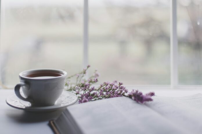 Photo by Sixteen Miles Out white ceramic teacup on white ceramic saucer on table